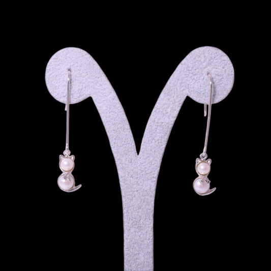 Gato nieve aretes largos